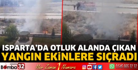 Isparta’da otluk alanda çıkan yangın ekinlere sıçradı.