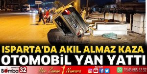 Isparta'da otomobil yan yattı