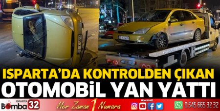 Isparta'da otomobil yan yattı