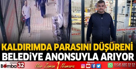 Kaldırımda parasını düşüreni arıyor