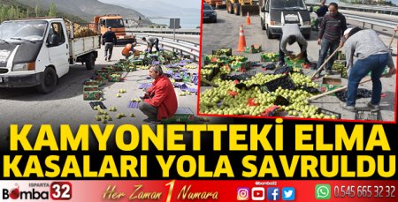 Kamyonetteki elma kasaları yola savruldu
