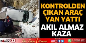 Kontrolden çıkan araç yan yattı