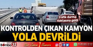 Kontrolden çıkan kamyon yola devrildi
