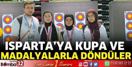 Kupa ve madalyalarla döndüler