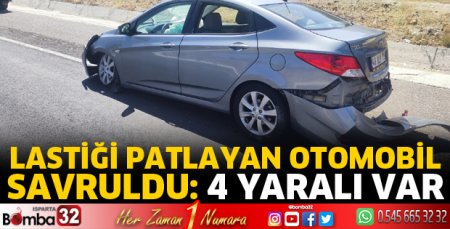 Lastiği patlayan otomobil savruldu 