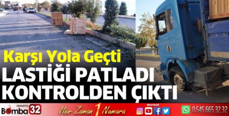 Lastiği patlayan TIR karşı şeride geçti