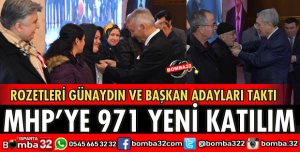 MHP'YE KATILANLARA ROZET TAKILDI