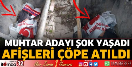 Muhtar adayı şok yaşadı Afişleri çöpe atıldı