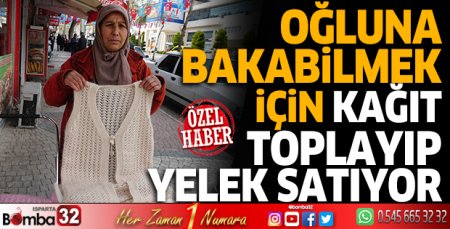 Oğluna bakabilmek için kağıt toplayıp, yelek satıyor