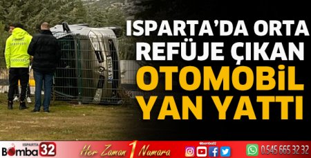 Orta refüje çıkan otomobil yan yattı 