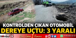 Otomobil dere yatağına uçtu