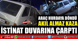 OTOMOBİL İSTİNAT DUVARINA ÇARPTI