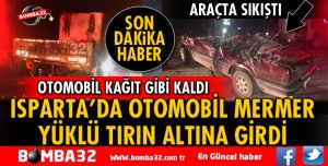 OTOMOBİL MERMER YÜKLÜ TIRIN ALTINA GİRDİ