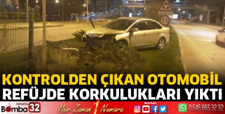 Otomobil refüjde korkulukları yıktı