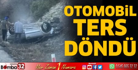 Otomobil ters döndü