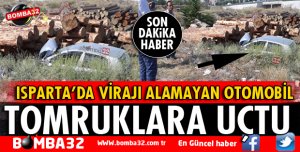 OTOMOBİL TOMRUKLARA ÇARPARAK DURABİLDİ