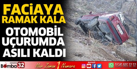 Otomobil uçurumda asılı kaldı