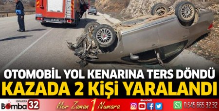 Otomobil yol kenarına ters döndü 2 kişi yaralandı