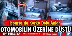 PARK HALİNDEKİ OTOMOBİLİN ÜZERİNE MANTOLAMA PARÇALARI DÜŞTÜ