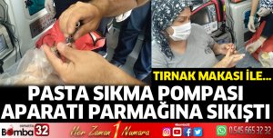 Parmağına pasta sıkma pompası aparatı sıkıştı