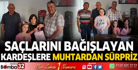 Saçlarını bağışlayan kardeşlere muhtardan sürpriz 