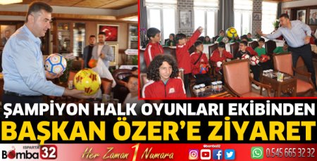 Şampiyon Halk Oyunları ekibinden Başkan Özer’e ziyaret