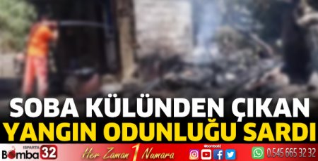 Soba külünden çıkan yangın odunluğu sardı 