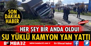 SU YÜKLÜ KAMYON YAN YATTI