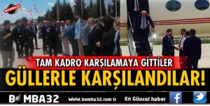SÜLEYMAN DEMİREL HAVALİMANINDA GÜLLERLE KARŞILANDILAR