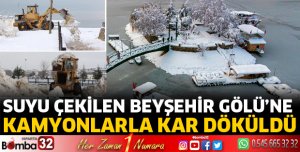 Suyu çekilen Beyşehir Gölü'ne kamyonlarla kar döküldü
