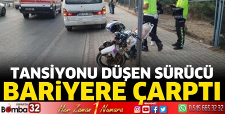 Tansiyonu düşen motosikletli bariyere çarptı