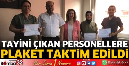 Tayini çıkan personellere plaket taktim edildi
