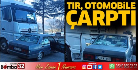 Tır otomobile çarptı