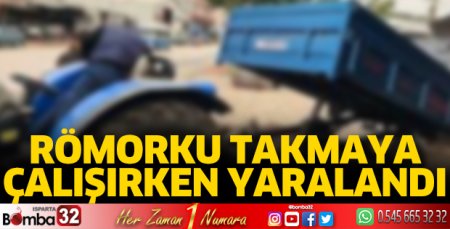 Traktör römorkunu takmaya çalışırken yaralandı