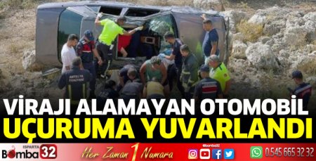 Virajı alamayan otomobil takla attı