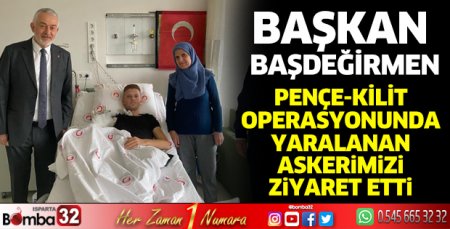 Yaralı askerimizi hastanede ziyaret etti