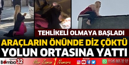 Yolun ortasına yatıyor, araçların önüne atlıyor