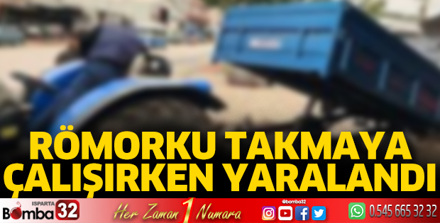 Traktör römorkunu takmaya çalışırken yaralandı