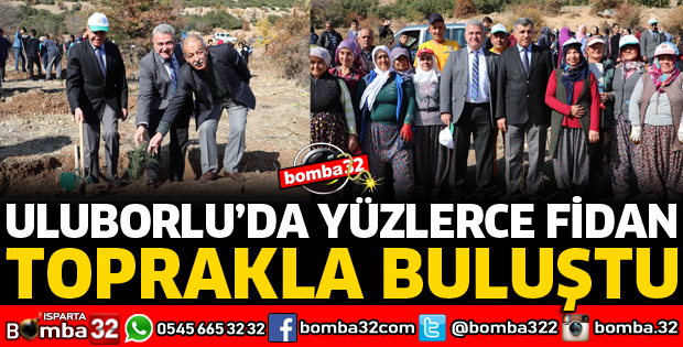 ULUBORLU'DA YÜZLERCE FİDAN TOPRAKLA BULUŞTU