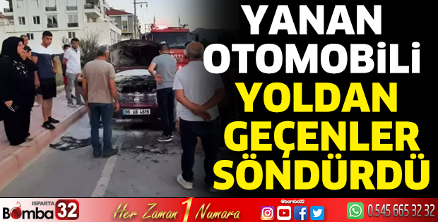 Yanan otomobili yoldan geçenler söndürdü